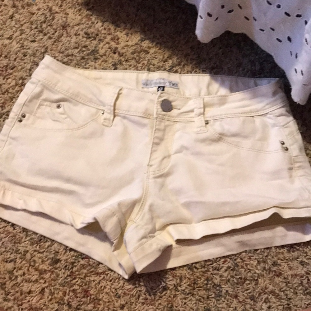 Low rise, off white jean shorts